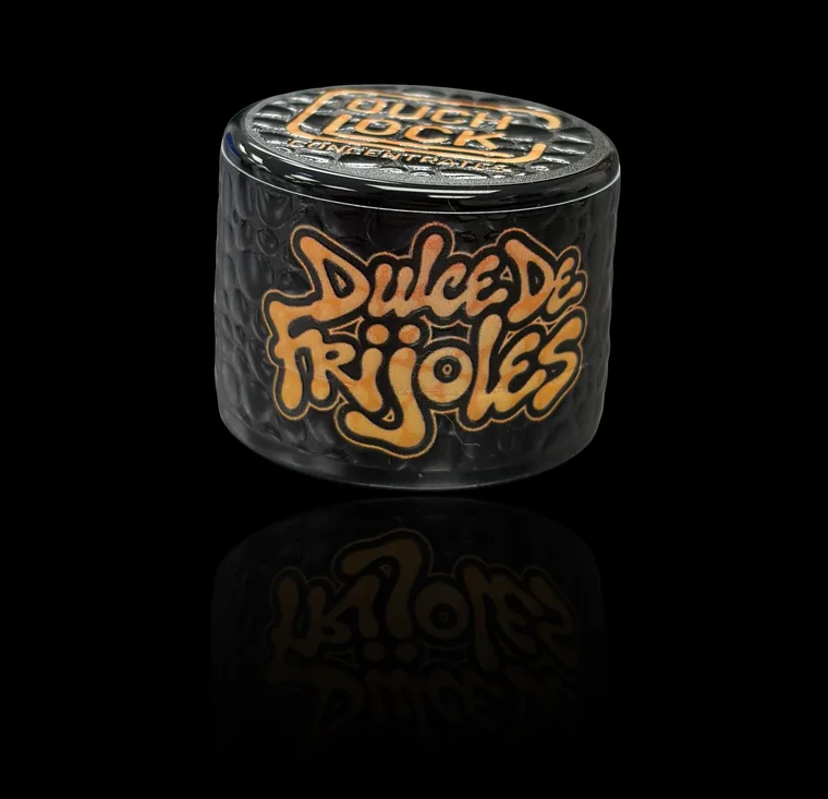 Dulce de Frijoles live rosin in a Couchlock tin